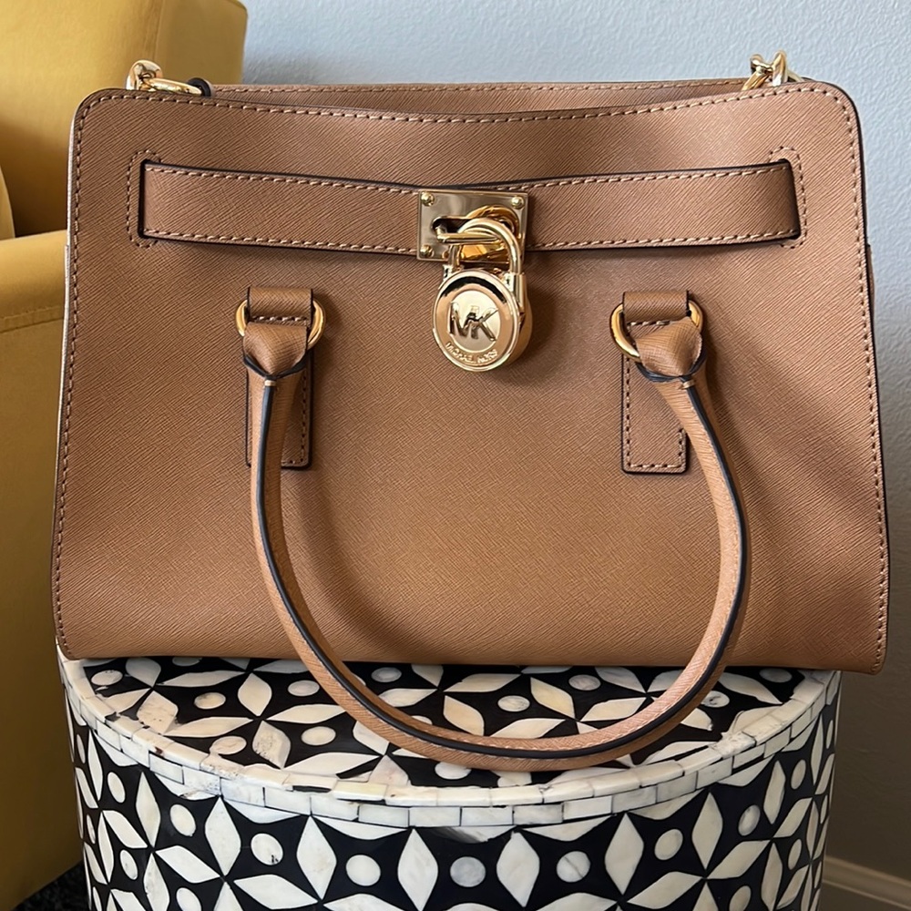 Almost Flawless tan Michael Kors Satchel with dust bag and shoulder strap.
